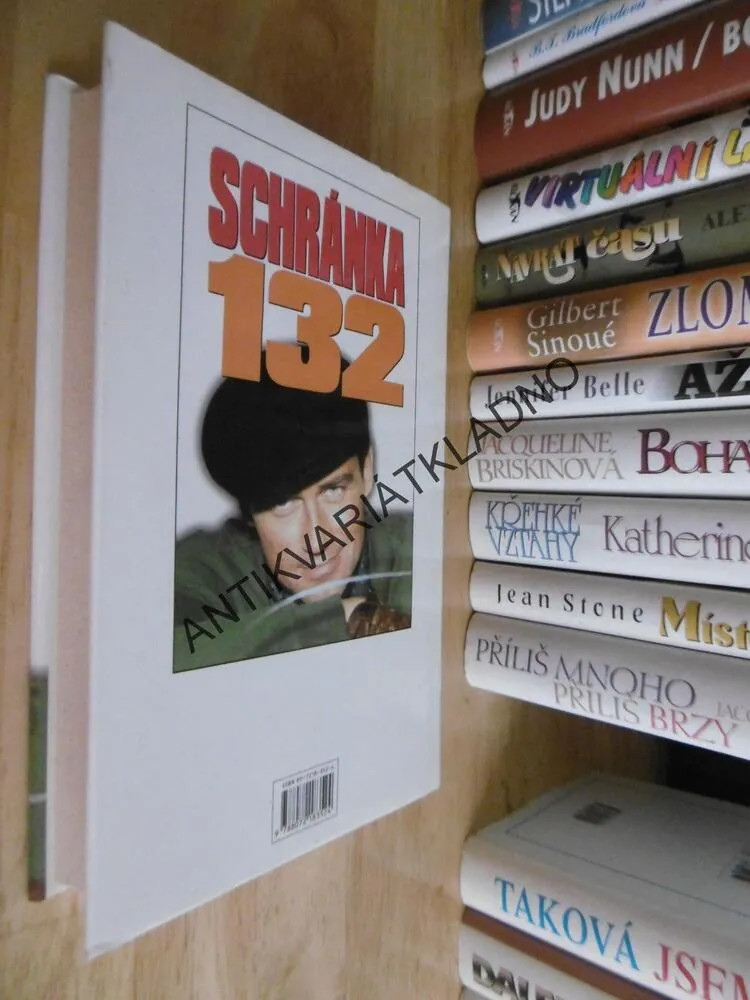 SCHRÁNKA 132, ALEX SHEARER, **an
