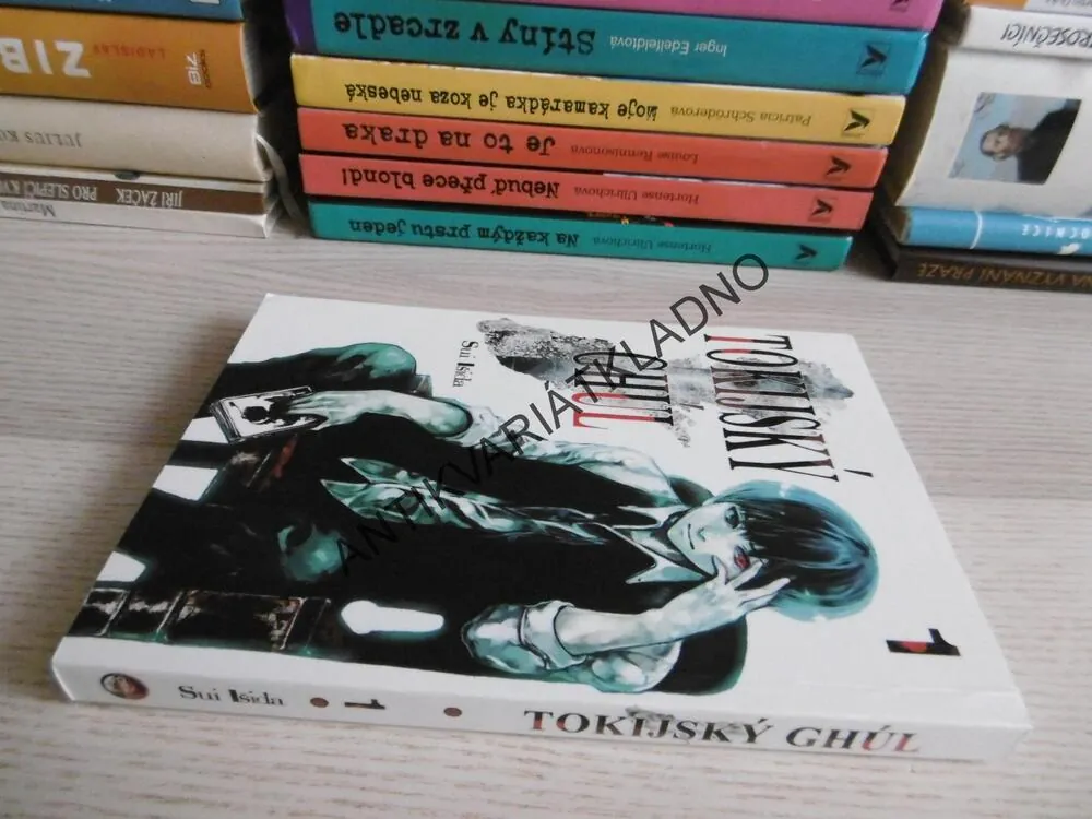 TOKIJSKÝ GHÚL 1, SUI IŠIDA, **an
