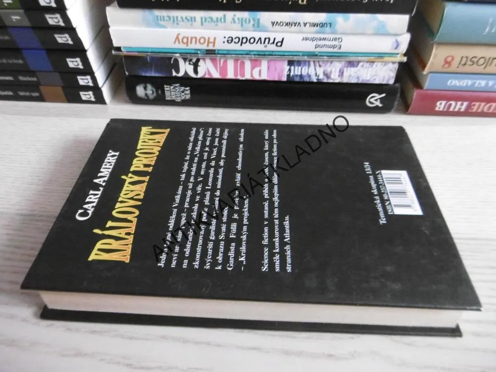 KRÁLOVSKÝ PROJEKT, CARL AMERY, **an