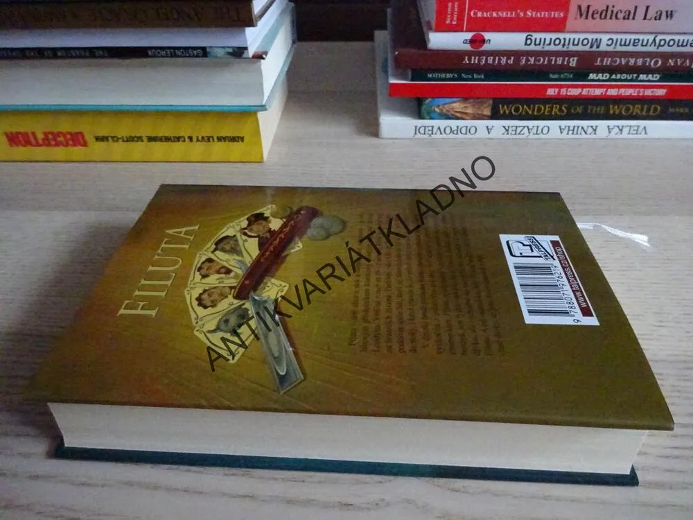 FILUTA, TERRY PRATCHETT, **an