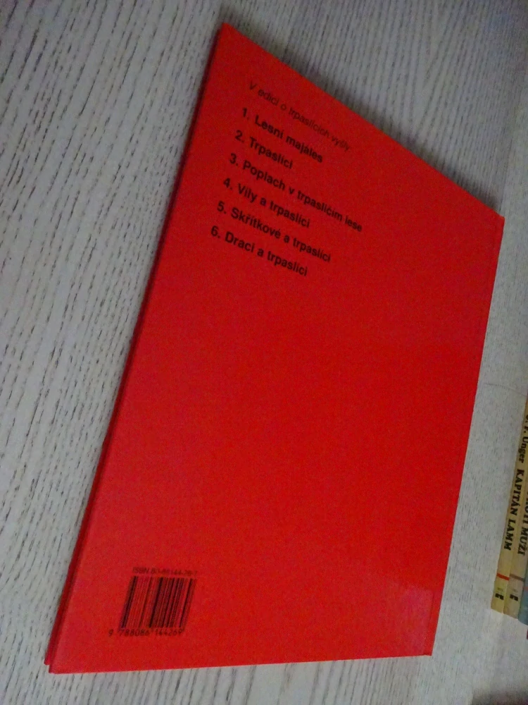 DRACI A TRPASLÍCI, TONY WOLF, **an
