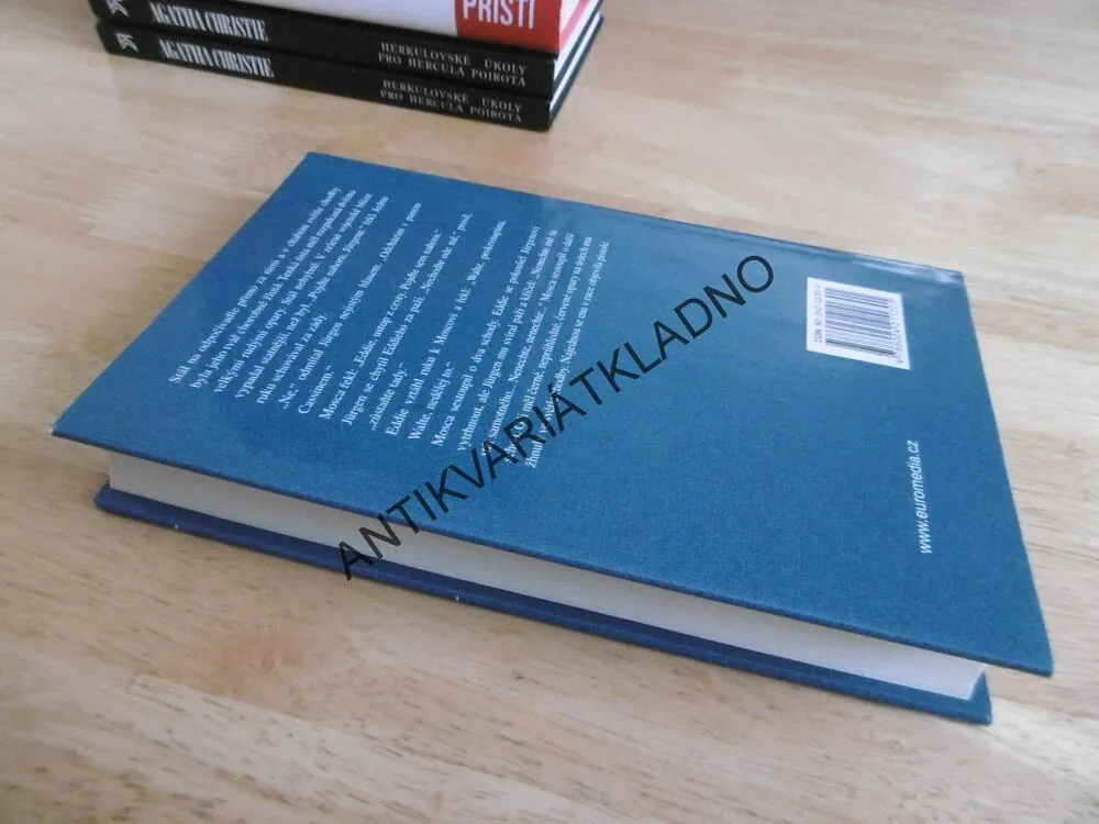 TEMNÁ ARÉNA, MARIO PUZO, **an