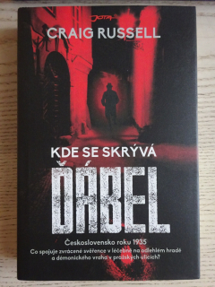 KDE SE SKRÝVÁ ĎÁBEL, CRAIG RUSSELL, **an