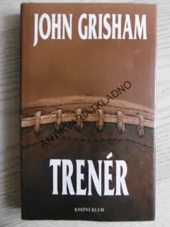 TRENÉR, JOHN GRISHAM, **an