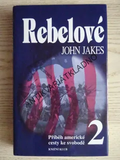 REBELOVÉ, JOHN JAKES, **an