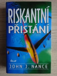 NEBEZPEČNÉ PŘISTÁNÍ, JOHN J. NANCE, **an
